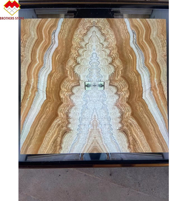 Style de conception moderne rétroéclairé en jaune Onyx Livre correspondant à la dalle d'onyx tigre naturel moderne