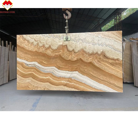 Style de conception moderne rétroéclairé en jaune Onyx Livre correspondant à la dalle d'onyx tigre naturel moderne