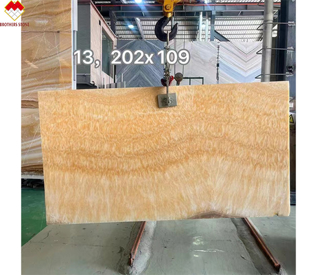 Design moderne Onyx translucide Beige Marbre Jaune Miel Onyx Slab pour une table de villa