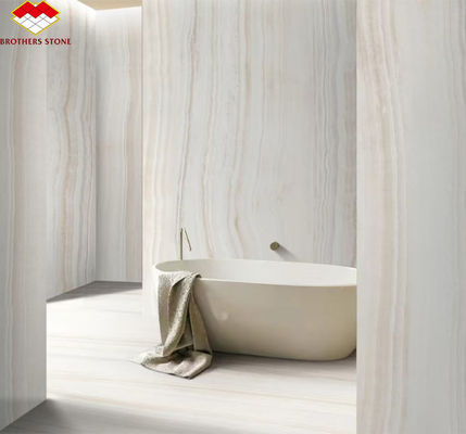 Panneau murale de salle de bain d'hôtel de design moderne avec rétroéclairage en pierre naturelle blanc marbre onyx
