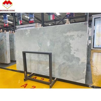 Panneau mural en onyx bleu translucide personnalisable pour le revêtement en marbre bleu