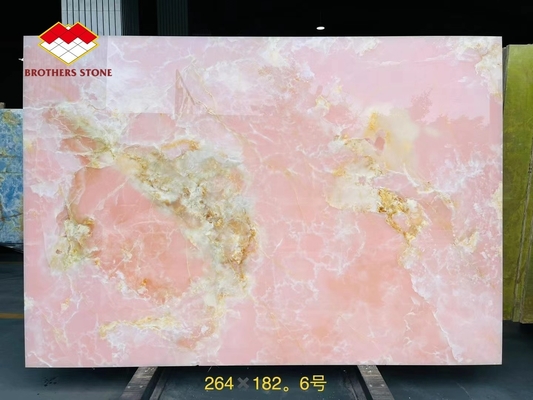 Plaques de table en porcelaine en onyx rose rétroéclairé de conception géométrique rose clair prix en gros escaliers translucides en onyx rose