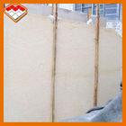Les dalles de marbre beiges de veines d'or ont adapté la taille aux besoins du client pour le mur/plancher